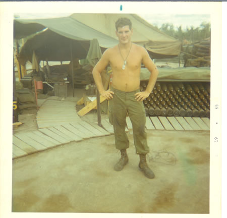 Gela_1969_-_Mercer_in_front_of_our_sleeping_tent.__Dixon_sitting_inside._fs