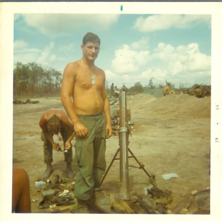Gela_May_12,_1969_-_82_mm_mortar_and_stuff_grunts_found_in_jungle_after_attack._fs