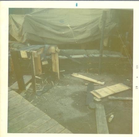 Gela_May_12,_1969_-_Wash_table_outside_of_our_sleeping_tent_hit_by_mortar_fs