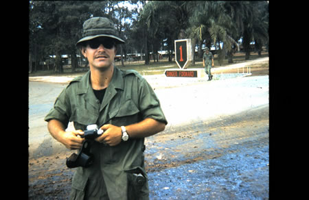 Lai_Khe_1969-70_-_Jim_Dodge_in_front_of_BRO_sign._fs